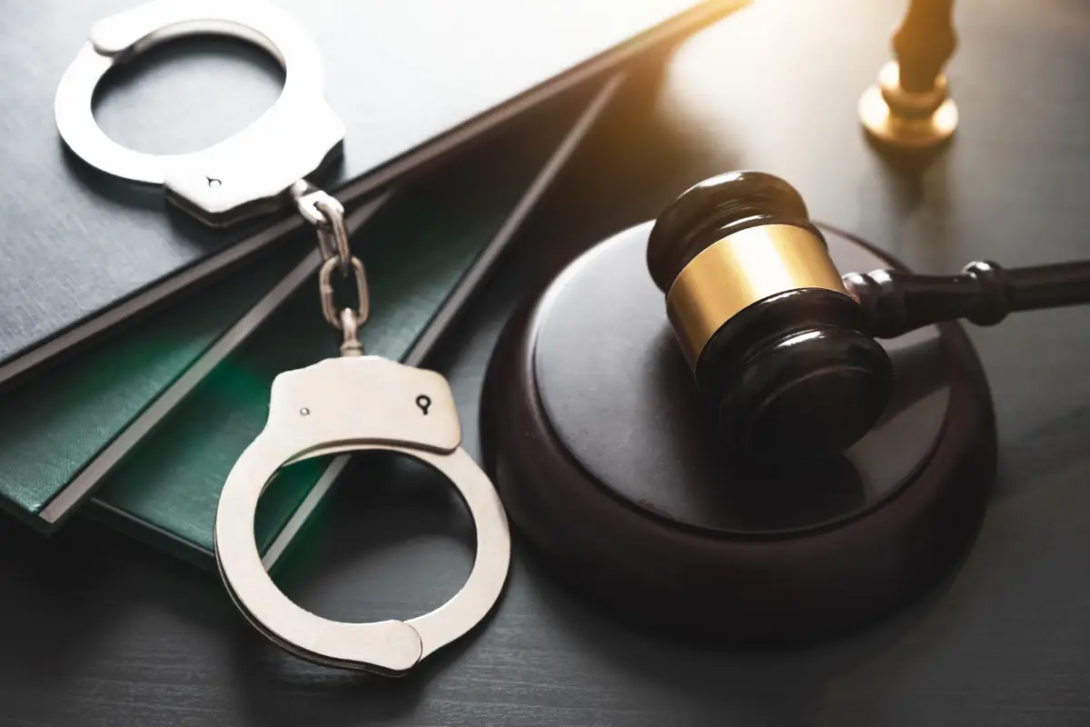 llustration of a judge granting bail in a courtroom, with legal documents and handcuffs symbolizing the bail process